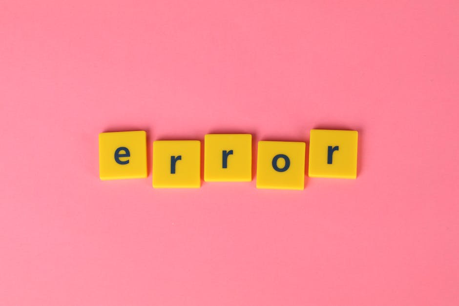 Yellow block letters spelling 'error' on a vibrant pink background, capturing a playful message.