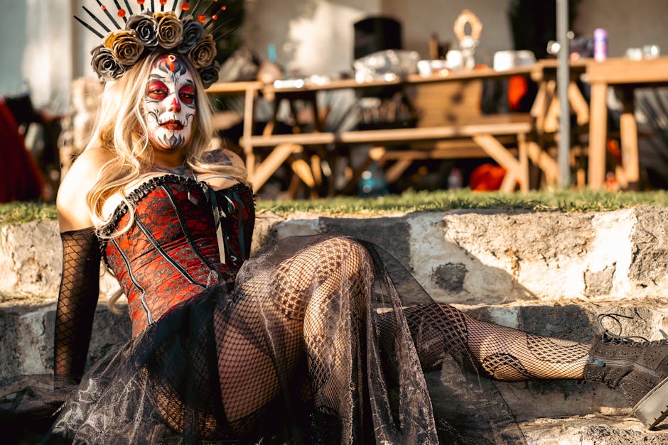 Vibrant Catrina costume and makeup at a Dia de los Muertos celebration in Mexico City.